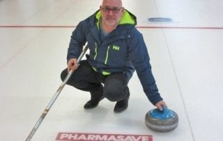 Pharmasave logo on curling ice