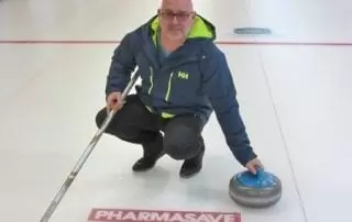 Pharmasave logo on curling ice Pharmasave logo on curling ice